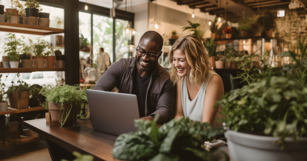 black man and white woman in a plant shop